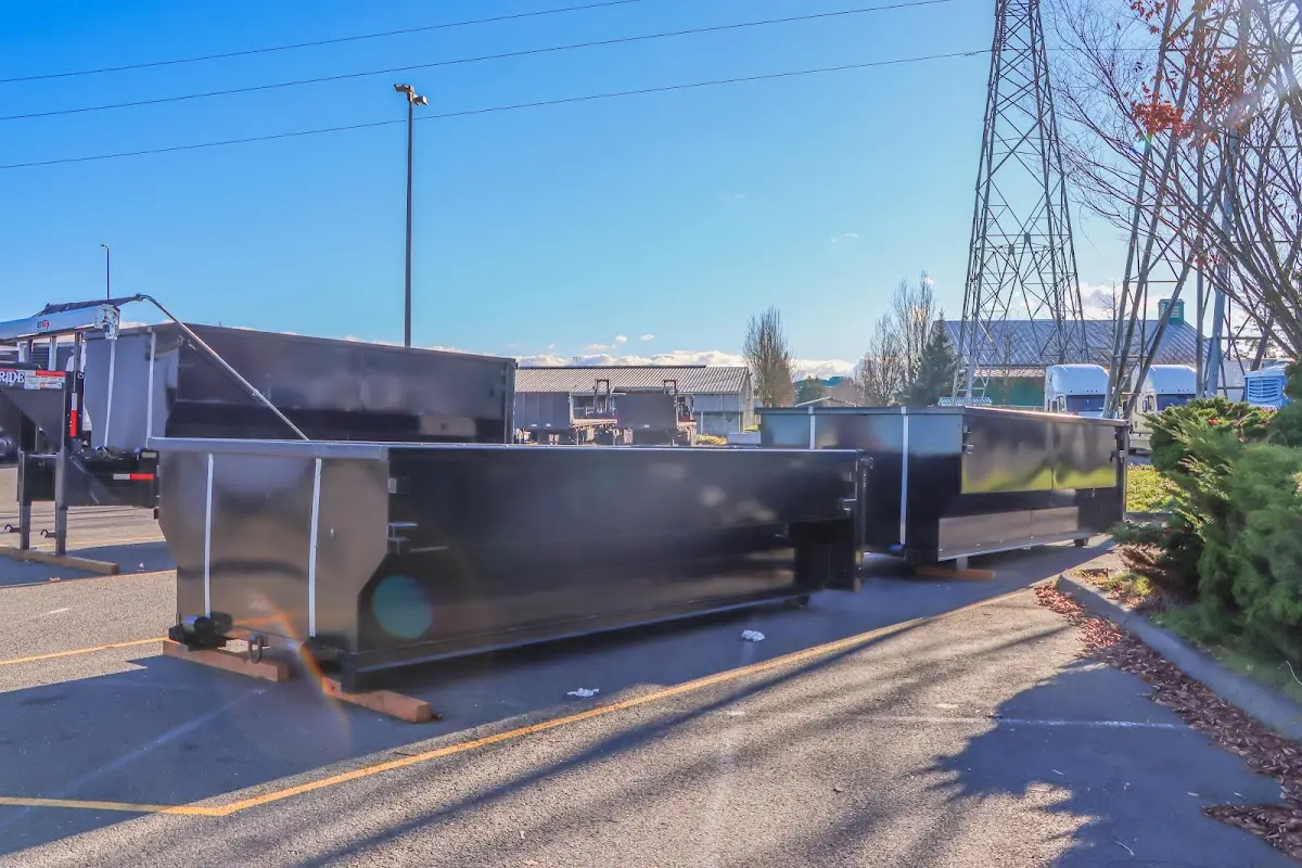 Roll-off dumpster ready for waste disposal at job site for 3 Yard Dumpster Rental in Ridgefield